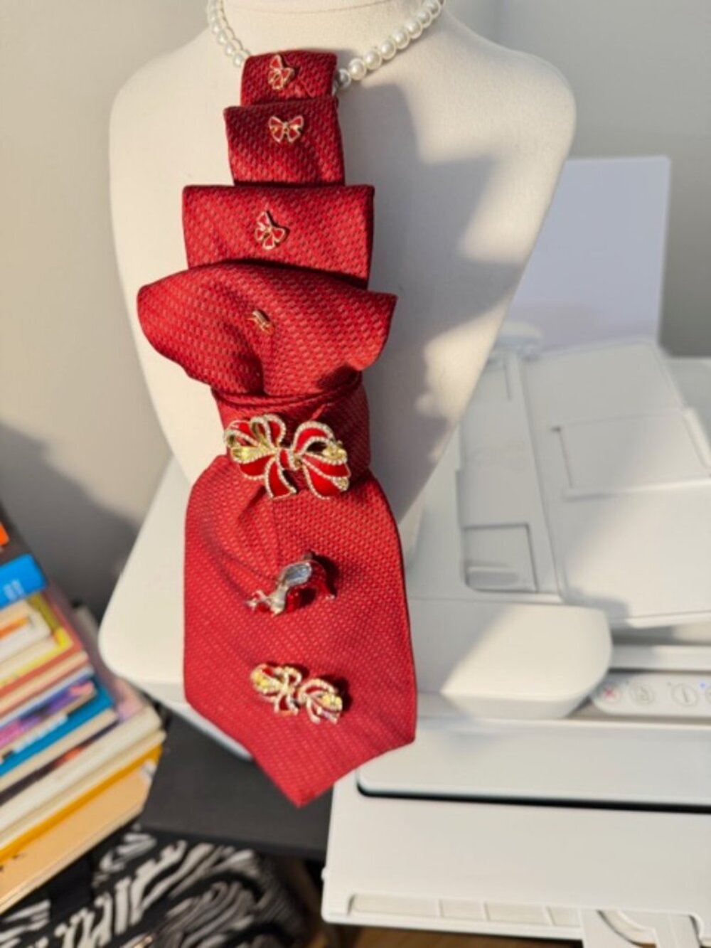 Red Metaphorical Necktie Necklace with Whimsical Brooches